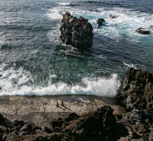 Scenic view of rocks in sea