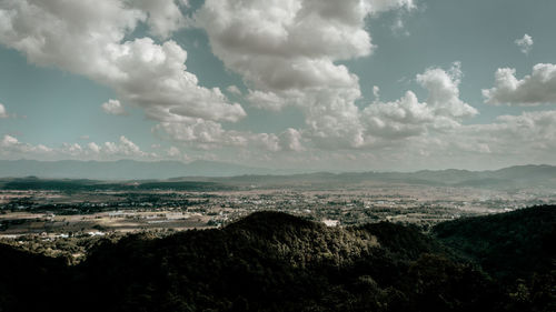 Aerial view of city against sky