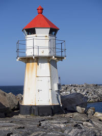 Lighthouse against blue sky