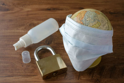 Close-up of padlocks on table