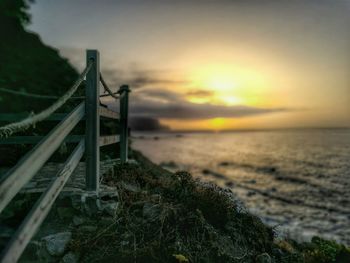 Scenic view of sea at sunset