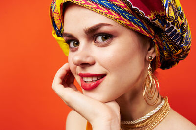 Close-up of young woman wearing hat