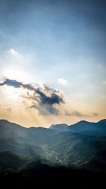 Scenic view of mountains against sky during sunset