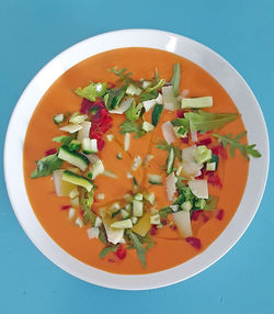 High angle view of chopped fruits in bowl on table