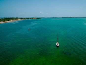 High angle view of sailboat in sea against sky