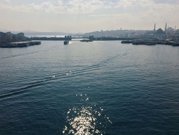 High angle view of ship sailing in sea against sky