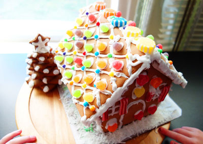 Close-up of decorated gingerbread house during christmas