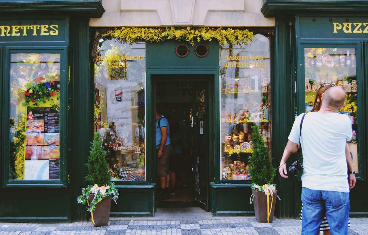 store, adults only, retail, entrance, outdoors, two people, business, bakery, adult, people, building exterior, store window, architecture, only women, day