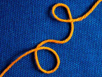 Close-up of human face over black background
