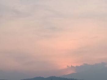 Low angle view of cloudy sky during sunset