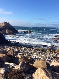 Scenic view of sea against clear blue sky