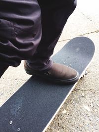 Low section of man standing outdoors