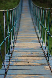 Wooden footbridge on footpath