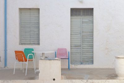 Chairs against window