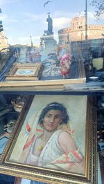 Portrait of man looking through window