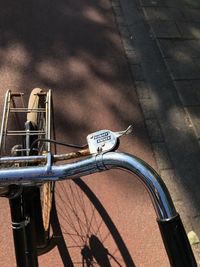 High angle view of bicycle parked on street