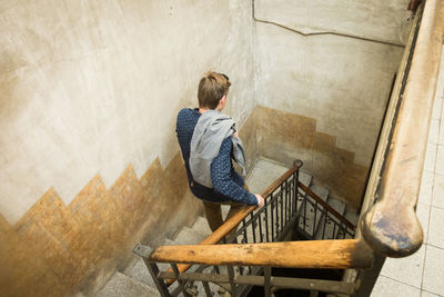 High angle view of person walking on steps