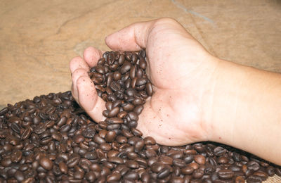 Close-up of person hand holding ice cream