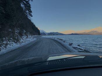 Road seen through car windshield