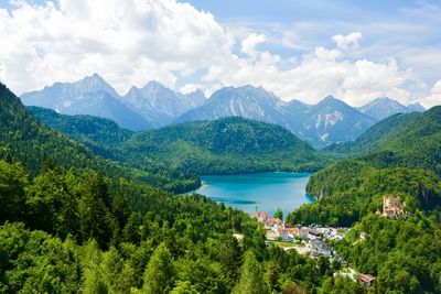 High angle view of trees and mountains against sky