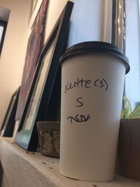 Close-up of coffee cup on table