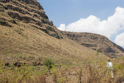 Scenic view of land against sky