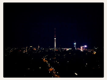 Illuminated cityscape at night