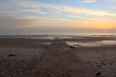 Scenic view of sea at sunset