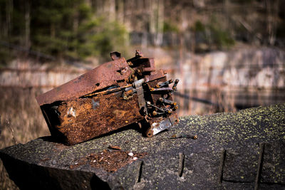 Close-up of rusty metal on retaining wall