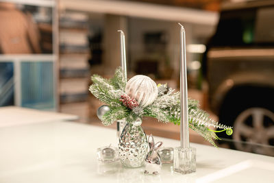 Close-up of christmas decorations on table