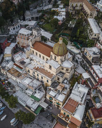 Aerial view of positano cathedral in downtown near the beach in wintertime, amalfi coast, salerno
