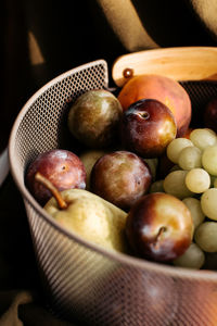 High angle view of fruits in basket on table