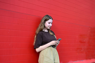 Young woman using mobile phone