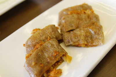 Korean spring roll with kimchi and vegetable at korean restaurant, seoul, south korea