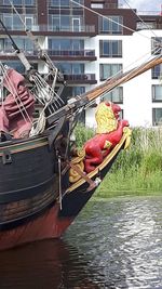 Boat moored in city