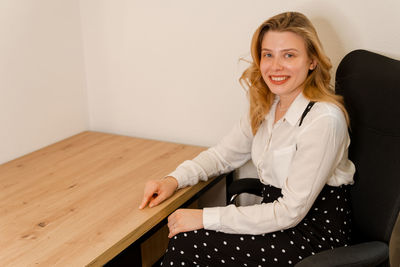 Portrait smile beautiful business woman working in office desk.