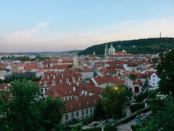 Houses in town against sky