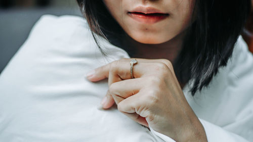 Close-up of woman with hands