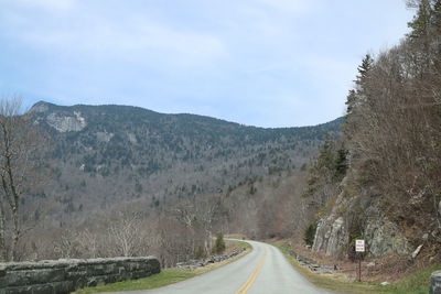 Road on mountain against sky