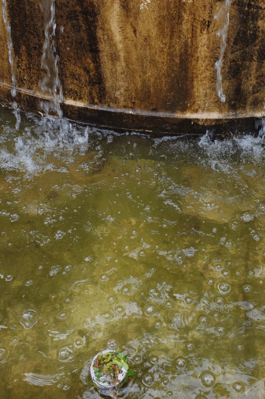 water, no people, motion, waterfront, nature, close-up, outdoors, day, architecture, flowing water, lake, high angle view, rippled, splashing, fountain, food and drink, bubble, full frame, flowing, purity