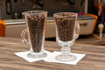 Close-up of glasses on table