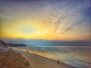 Scenic view of sea at sunset