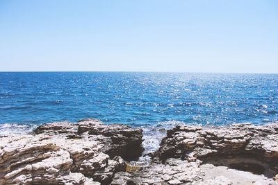 Scenic view of sea against clear sky