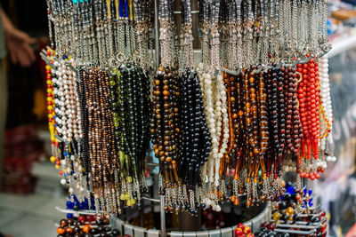 Close-up of decoration hanging for sale at market stall