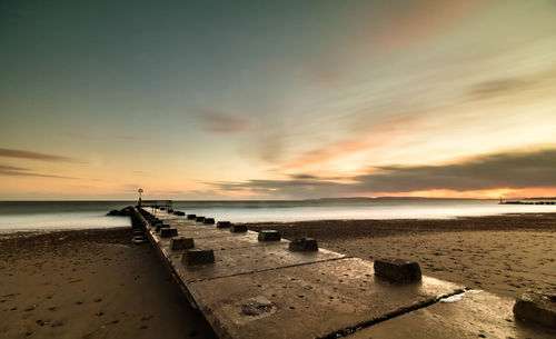 Scenic view of sea at sunset