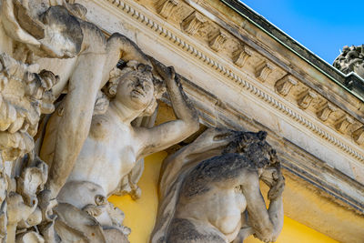 Low angle view of statue of historic building