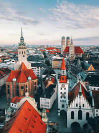 High angle view of buildings in city against sky