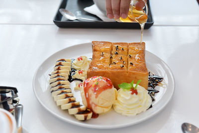 High angle view of dessert in plate on table