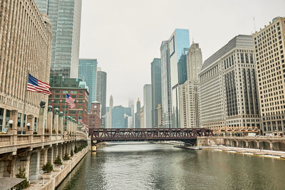 View of bridge over river in city