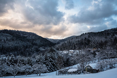 Scenic view of dramatic sky over landscape